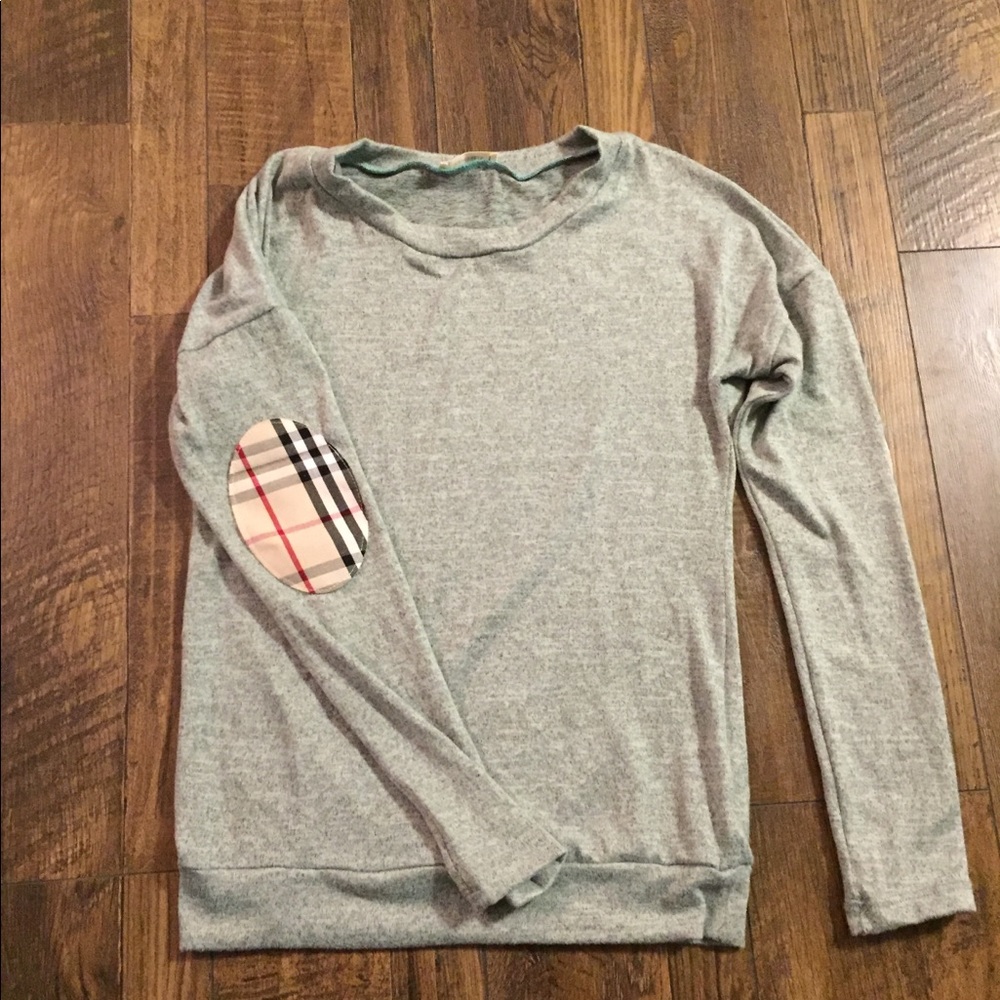 Green tunic sweater.